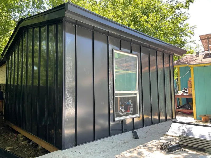 Black standing seam metal wall panels for Metal Roof Installation in Lakewood