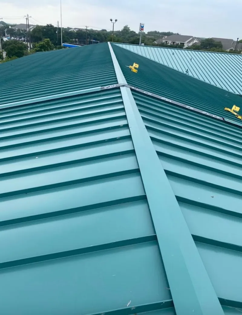 Green commercial metal roof ridge and valley for Metal Roof Repair in Lakewood